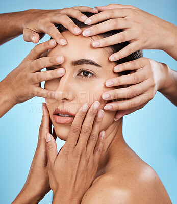 Buy stock photo Touching, hands and face of a woman for skincare isolated on a blue background in a studio. Consultation, check and girl with people feeling for facial acne, problem and dermatology on a backdrop