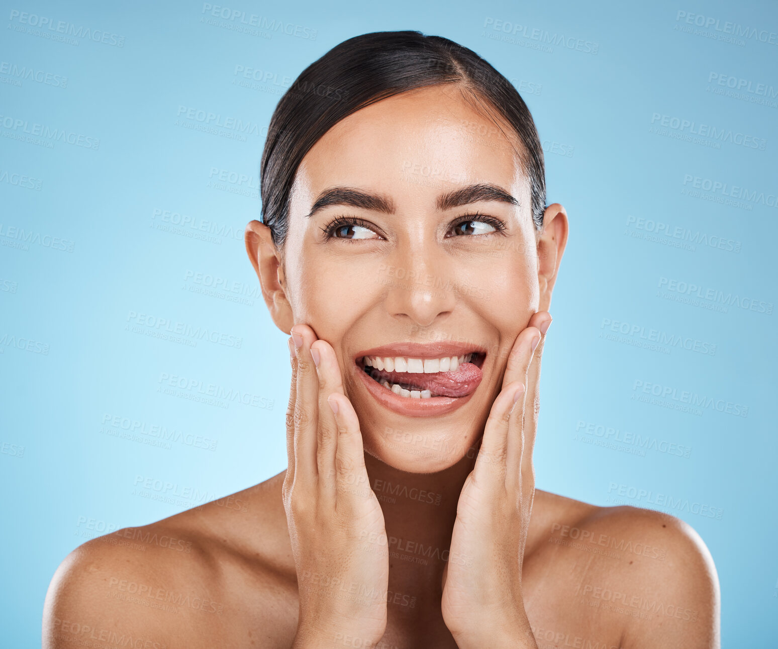 Buy stock photo Face, tongue out and beauty skincare of woman in studio isolated on a blue background. Thinking, makeup or cosmetics of female model with healthy, glowing and flawless skin after spa facial treatment