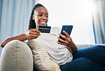 Credit card or black woman with phone for online shopping or payment, internet purchase or ecommerce in living room. Fintech, happy or girl on smartphone for trading, banking or invest on home sofa