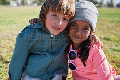 Buy stock photo Friends, portrait and kids hug at park while bonding, smile and having fun together outdoors. Diversity, care and children hugging, cuddle and embrace while enjoying quality time on holiday vacation.