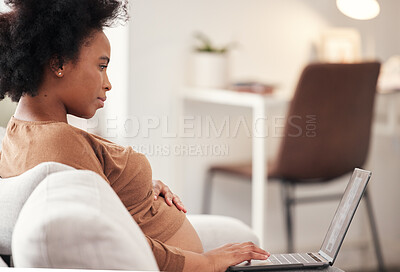 Buy stock photo Pregnant, black woman and laptop on sofa in home living room for social media. Pregnancy, remote worker and female freelancer typing on computer in lounge for working, research or internet browsing.