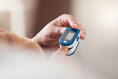 Buy stock photo Blood pressure, hand holding technology and background for healthcare check, diabetes or hypertension. Digital device, medical self care and finger or hands with wellness for heart rate check