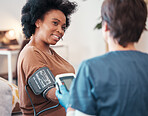 Black woman, healthcare and checkup with caregiver monitoring or checking blood pressure or pulse at home. Happy African American female patient or visit from medical nurse for health and wellness