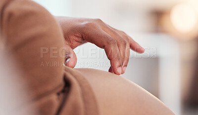 Buy stock photo Pregnancy, prenatal and woman touching her tummy to play with baby bump in her house. Maternity, love and pregnant African female holding her stomach for motherhood, maternal love and care at home.