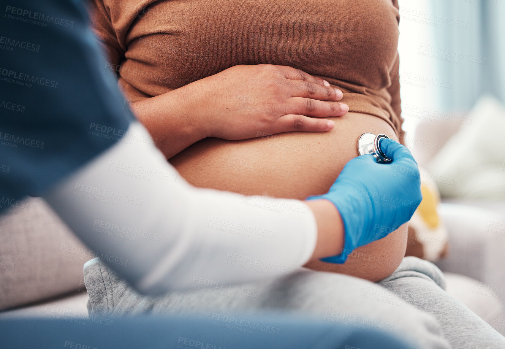 Buy stock photo Closeup, pregnant and woman with healthcare checkup and stomach with wellness, appointment and results. Zoom, pregnancy and female with doctor, stethoscope and medical professional for consultation 