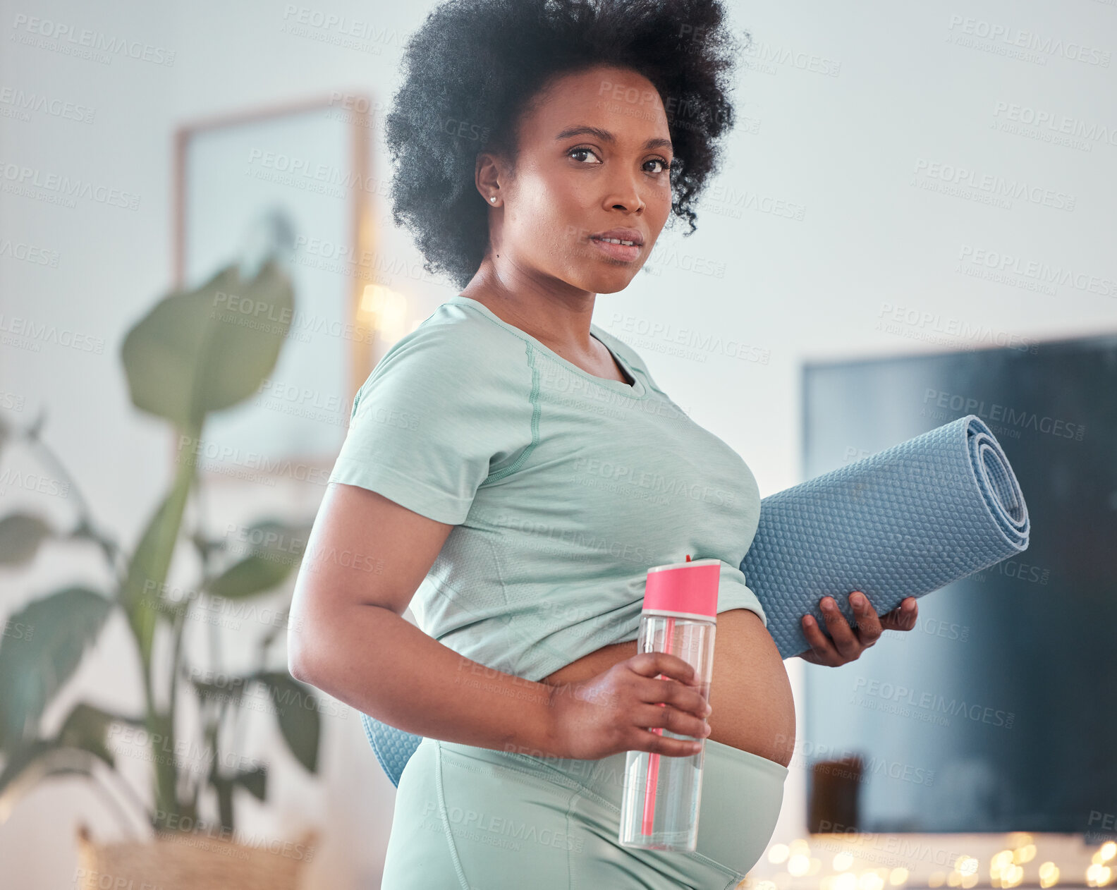 Buy stock photo Yoga, pregnant and portrait of black woman in home ready to start exercise, training or workout for health or fitness. Pregnancy, zen pilates and future mother with mat and water bottle for hydration