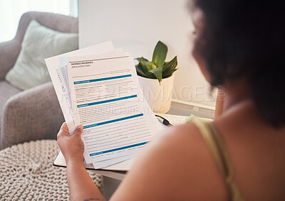 Buy stock photo Paperwork, health insurance and woman reading in her house for healthcare hospital treatment. Planning, home and African female analyzing a medical document in the living room of her apartment.