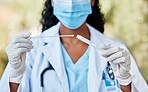 Woman, doctor and hands with nasal swab, mask and gloves holding covid flu test, DNA or sample. Hand of female medical expert with cotton stick for testing, examine or experiment in cure for illness