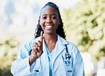 Black woman, doctor and hand for healthcare, health insurance and medical care for wellness. Finger or a medical professional as expert in medicine and healing with pride for development and advice