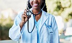 Woman, stethoscope and cardiology woman in healthcare, life insurance and medical care for wellness. Hand of medicine professional expert in heart health, healing and life saving consultation check