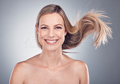 Buy stock photo Woman in portrait, smile and face with hair in air, beauty and keratin treatment, cosmetic care isolated on studio background. Happy model, glow and hairstyle shine, natural cosmetics and skincare