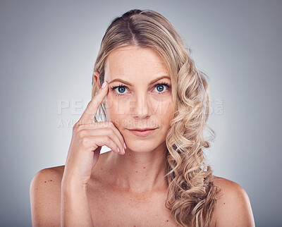 Buy stock photo Beauty, hair care and portrait of a woman in studio with natural makeup cosmetics and shampoo for shine. Face of aesthetic model person on a grey background for hairdresser or salon curly treatment