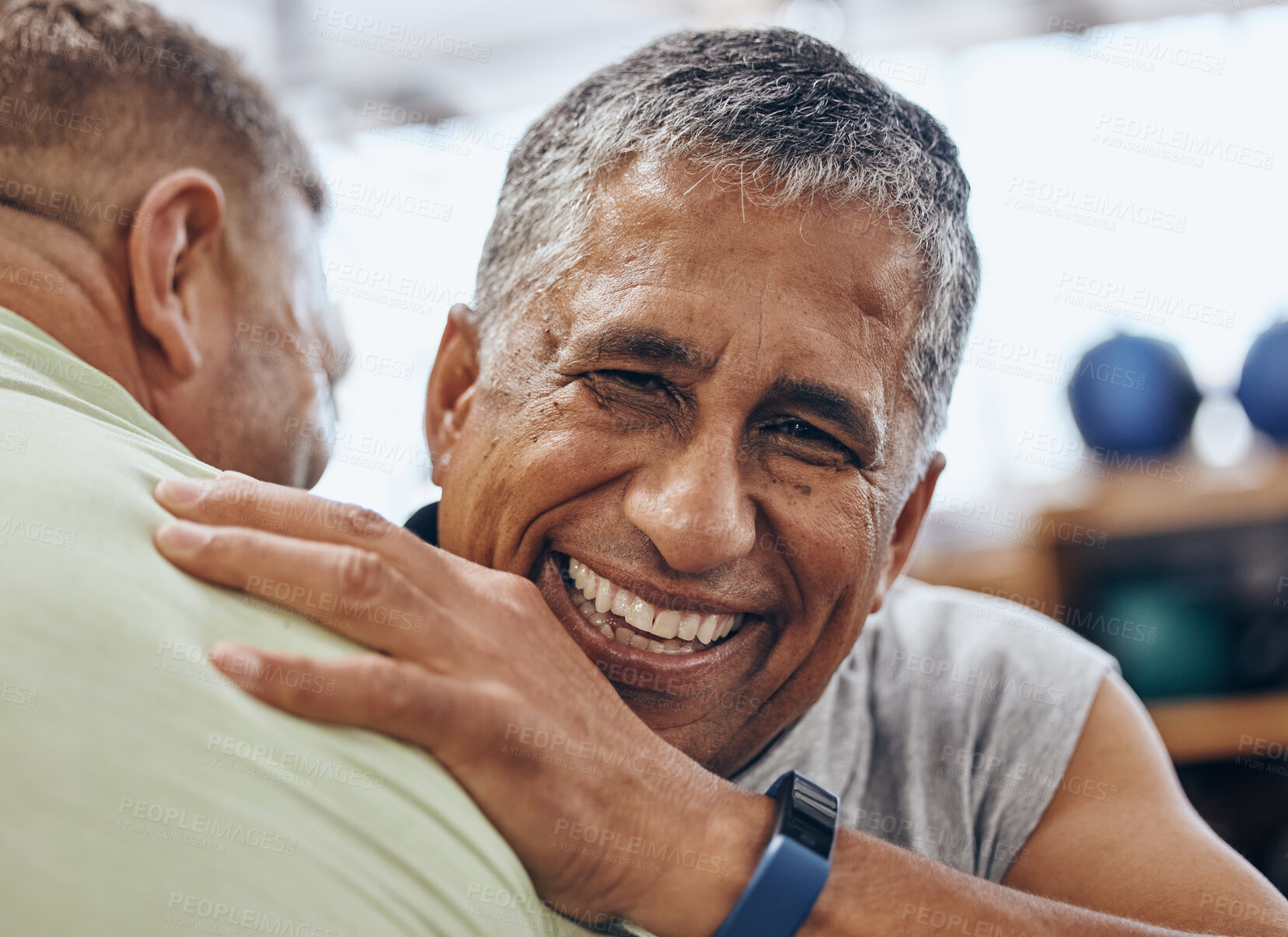 Buy stock photo Friends, fitness and man with personal trainer in gym for teamwork, support and motivation for workout. Sports, retirement and face of senior male hug ready for exercise, training and cardio wellness