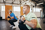 Men, exercise and gym with dumbbells for health and wellness for retirement fitness and energy. Senior or mature people class for squat workout or training for strong body muscle and goals motivation