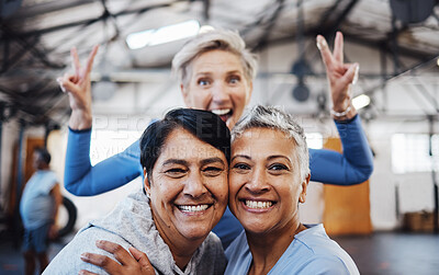 Buy stock photo Business women, senior portrait and happiness of company friends in a warehouse with peace sign. Smile, teamwork hug and mature female group of happy entrepreneur staff ready for working together 