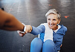 Exercise, helping old woman and fitness with smile, workout and training for wellness, health and balance. Sports, mature female and senior citizen with happiness, help up from floor and support