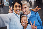 Fitness women, portrait or peace sign selfie in gym, workout or training for healthcare wellness or bonding exercise. Happy smile, comic or mature sports in diversity friends group or community fun