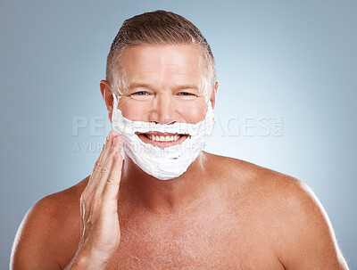 Buy stock photo Shaving cream, happy and portrait of old man in studio for skincare, grooming and beauty on grey background. Face, foam and hair removal for mature model smile for skin, beard and shampoo product