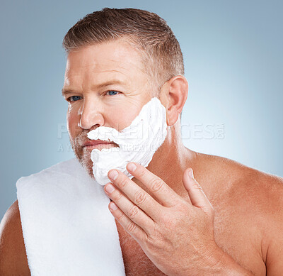 Buy stock photo Shaving cream, product and old man in studio for skincare, grooming and beauty on grey background. Face, foam and hair removal for mature model relax with luxury, beard and treatment while isolated