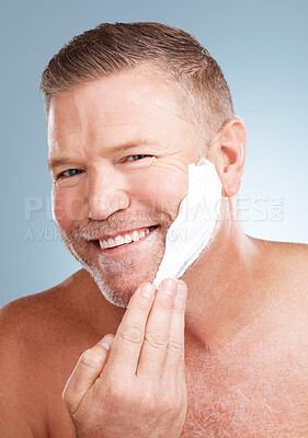 Buy stock photo Shaving, cream and portrait of old man in studio for skincare, grooming and beauty on grey background. Face, foam and hair removal for mature model relax with luxury, skin and product while isolated