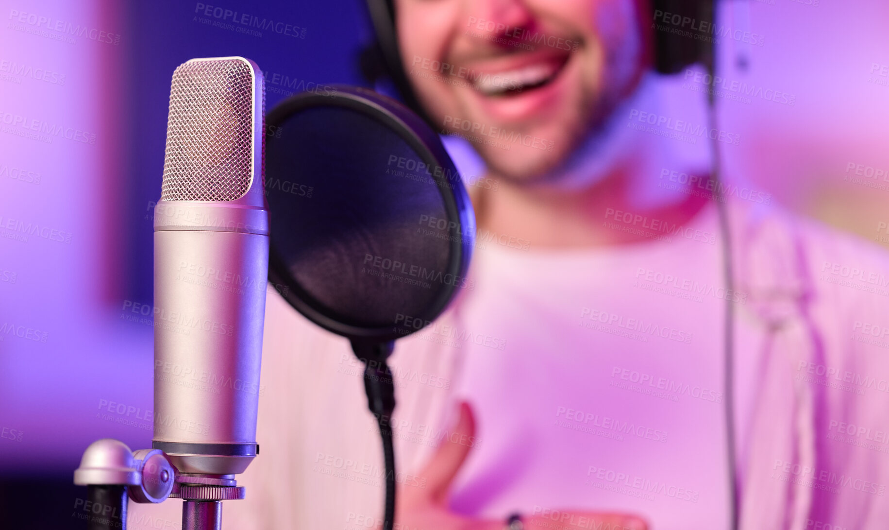 Buy stock photo Neon, studio or microphone singer, musician or pop artist in music practice, theatre or night recording. Singing, man or person on voice diffuser, production equipment or sound media in light theater