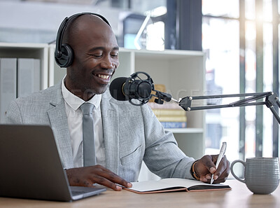 Buy stock photo Radio host, black man and networking with laptop, smile and writing for interview, speaking and business influencer. Presenter, African male and speaker with notebook, microphone and audio broadcast