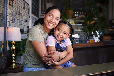 Buy stock photo Portrait, mother and daughter hug in cafe, loving and bonding together on weekend break, smile and joy. Face, mama and girl embrace in coffee shop, happiness and mom show love, relax and quality time