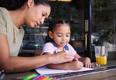Buy stock photo Coffee shop, black family and art with a woman and daughter using crayons to color a book in a cafe together. Juice, coloring and creative with a mother and happy female child bonding in a restaurant