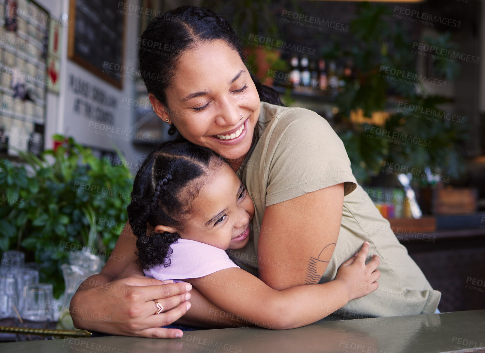 Buy stock photo Cafe, mother and kid hug in restaurant for love, care and quality time together. Happy parent hugging girl child in coffee shop at table for happiness, smile and embrace for bonding, relaxing and fun