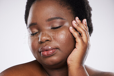 Buy stock photo Makeup, beauty and young black woman with hands and face zoom for spa and skincare aesthetic. White background, isolated and studio model with skin glow from dermatology and facial wellness results