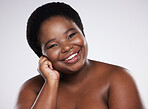 Happy black woman, portrait smile and skincare beauty with teeth, cosmetics or makeup against a gray studio background. African American female smiling in satisfaction for self love, care or facial