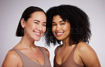 Buy stock photo Women, face and diversity with portrait, smile with skincare for different skin color with beauty isolated on studio background. Natural cosmetics, glow and dermatology, inclusion and facial care