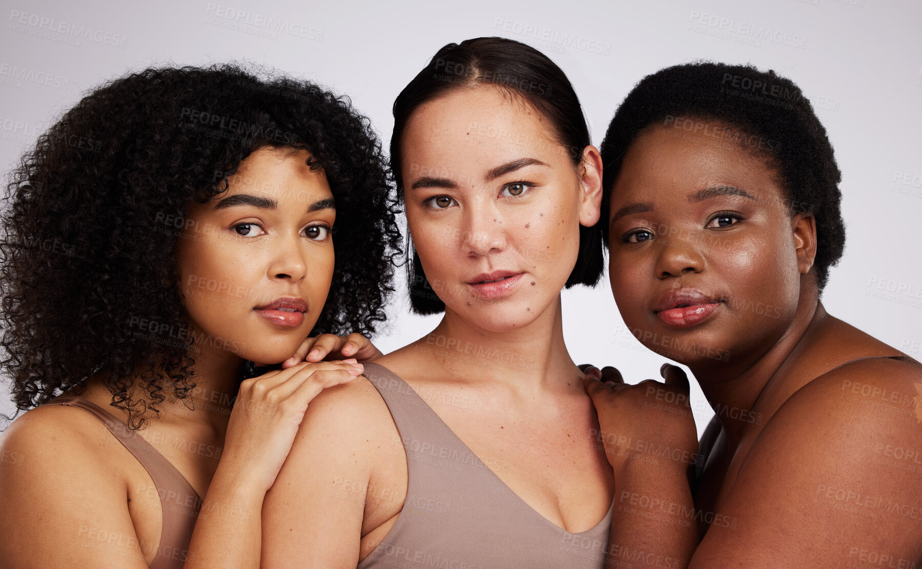 Buy stock photo Portrait, beauty and diversity with woman friends in studio on a gray background together for skincare. Face, makeup and natural with a female model group posing to promote support or inclusion