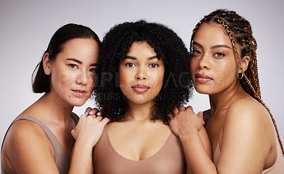 Buy stock photo Portrait, makeup and diversity with woman friends in studio on a gray background together for skincare. Face, beauty and natural with a female model group posing to promote support or inclusion