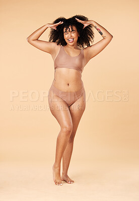 Buy stock photo Hair care, tongue out and beauty of black woman in lingerie in studio isolated on a brown background. Underwear, skincare and cosmetics of happy young model with spa treatment for growth and texture.