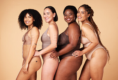 Buy stock photo Diversity women, body shape and portrait of group together for inclusion, natural beauty and power. Underwear model friends happy on beige background with cellulite, pride and self love motivation