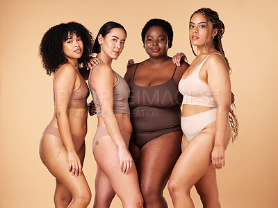 Buy stock photo Body, skin and diversity women portrait of group together for inclusion, beauty and power. Underwear model friends hug on beige background with skincare, color pride and motivation for self love