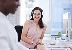 Woman, call center and portrait by pc in office desktop for consulting job with smile, vision and glasses, Crm expert, headphones and black man in tech support, customer service and contact us team