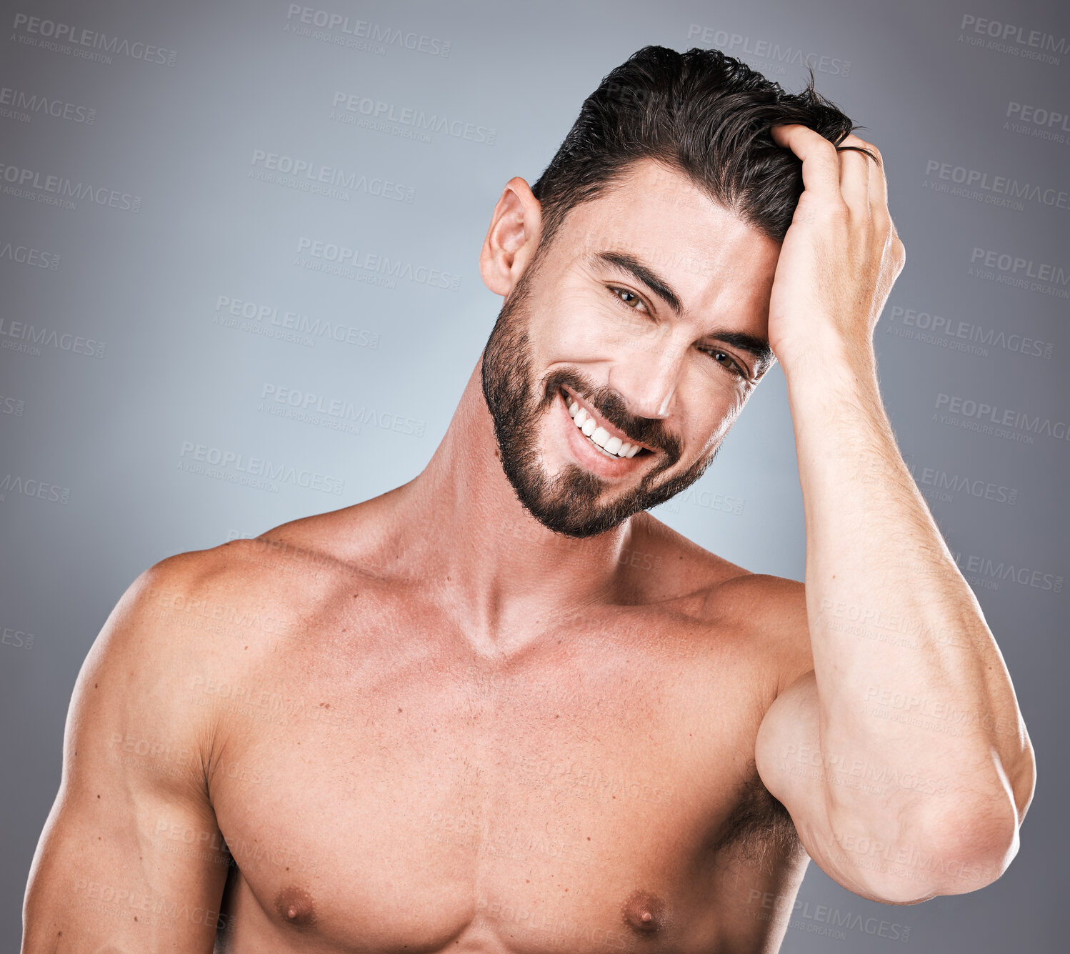 Buy stock photo Skincare, smile and portrait of man with hand in hair, sexy beard maintenance and healthy beauty. Fitness, health and spa facial care, male model with muscle in studio isolated on grey background.