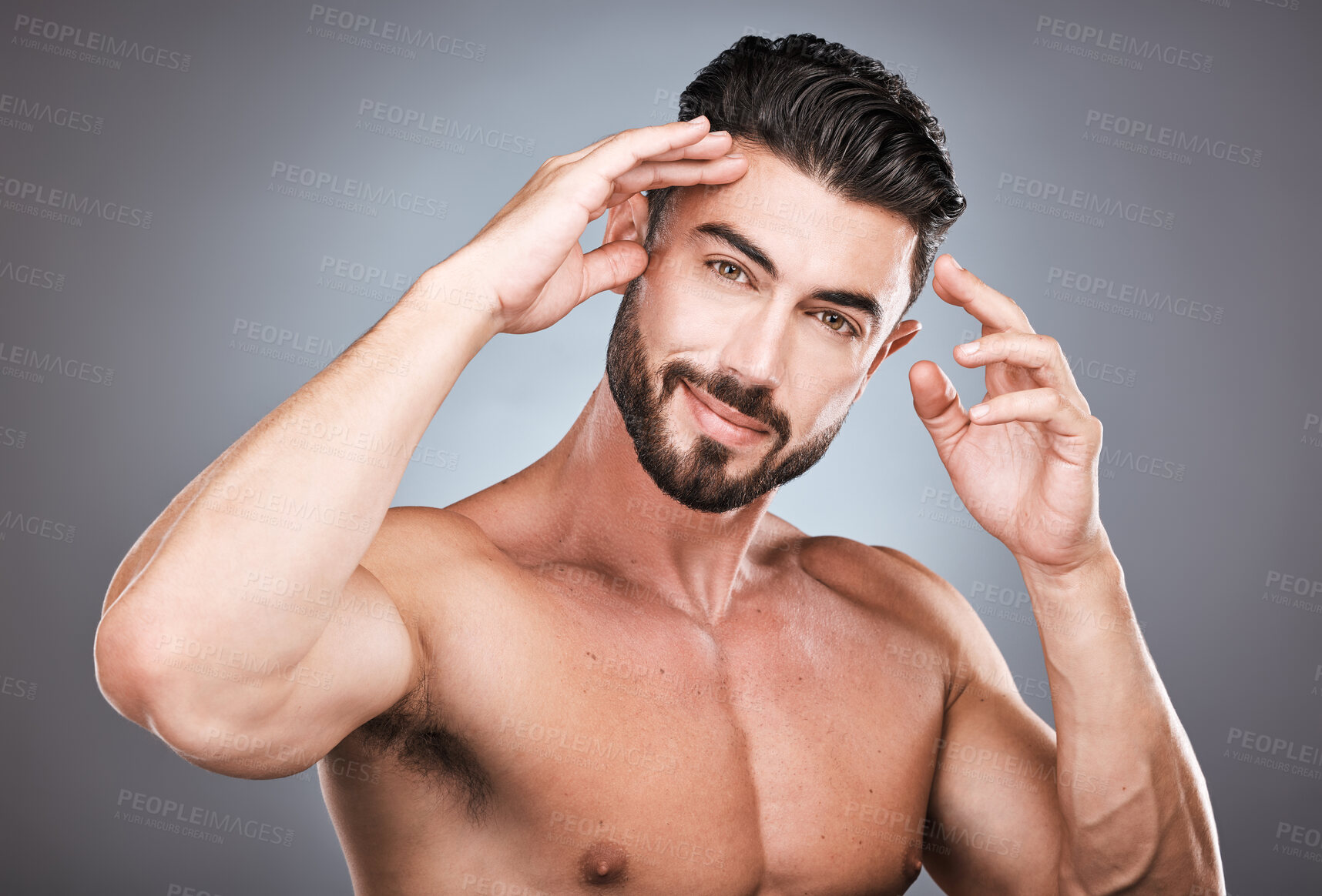 Buy stock photo Skincare, beauty and health, portrait of man with smile, hands on head and hair or beard maintenance. Fitness, health and spa facial care, male model with muscle in studio isolated on grey background