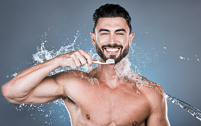 Buy stock photo Water splash, brushing teeth and portrait of man with toothbrush, dental wellness and healthy mouth care. Happy male model, oral cleaning and fresh breath for smile, happiness and shower cosmetics 