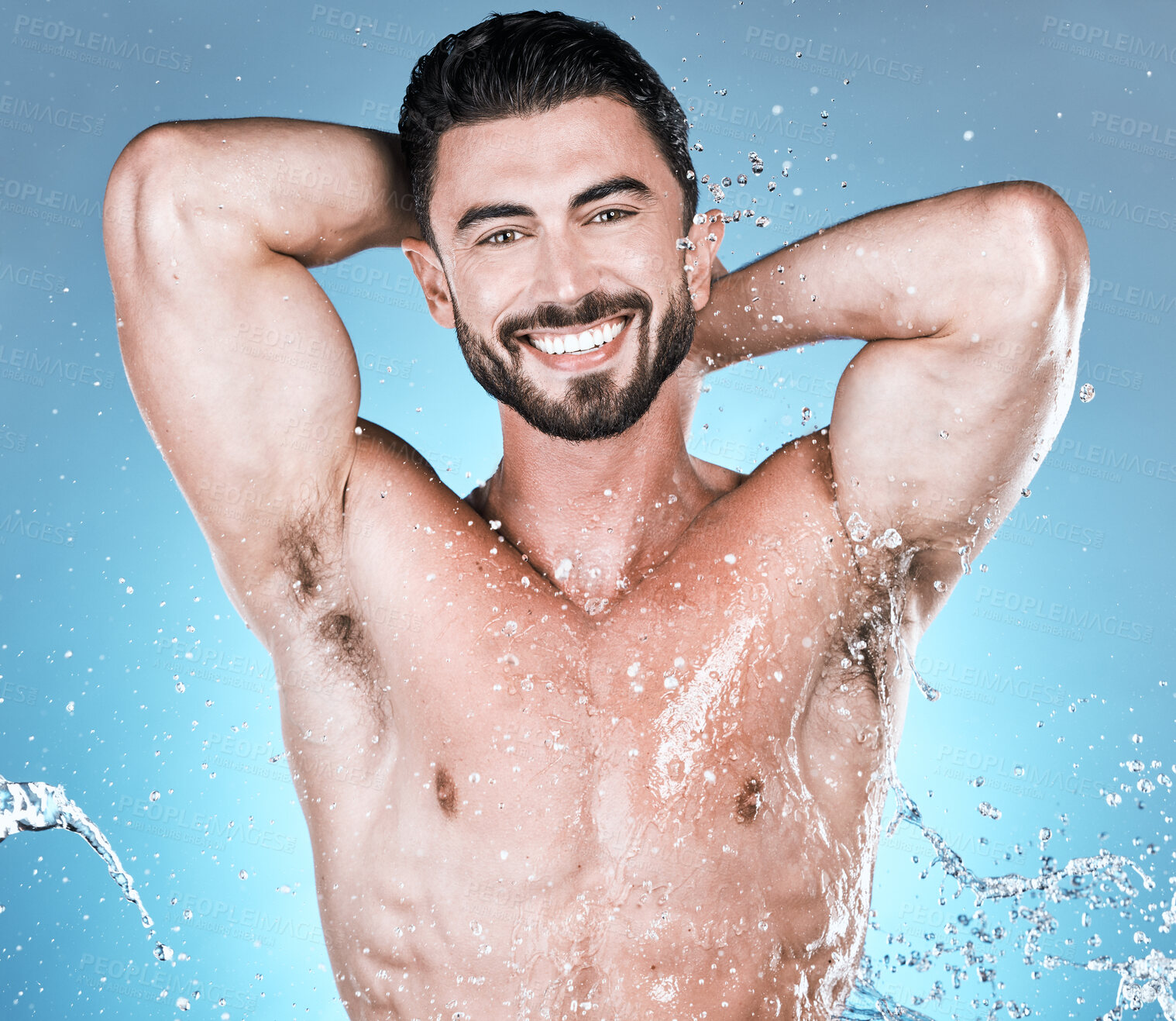 Buy stock photo Water, hygiene and shower with man in portrait for beauty and skincare isolated on blue background. Smile, face and cleaning body with muscle, sustainability and happy with natural cosmetics