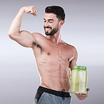 Protein shake, fitness and muscle with portrait of man for workout, health and bodybuilder. Diet, gym and training with athlete and powder for sports, exercise and nutrition in gray studio background