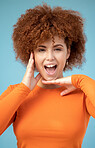 Confident, happy and portrait of a woman with hands for frame isolated on a blue background. Smile, crazy and face of an African girl with a wow facial expression, excited and funny on a backdrop