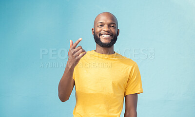 Buy stock photo Black man, portrait or hand gesture on blue background, isolated mockup or wall mock up in cool story, hey or attention. Smile, happy face or student in trendy, stylish or fashion clothes on backdrop