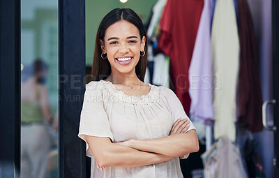 Buy stock photo Fashion, clothing store and portrait of a woman entrepreneur standing in her small business. Startup, confidence and happy female shop owner from Mexico with crossed arms in her luxury boutique.