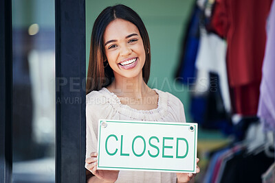 Buy stock photo Business owner, holding and portrait of a woman with a sign for a closed shop in the afternoon. Smile, entrepreneur and retail employee showing a board for a store closure, advertising and news