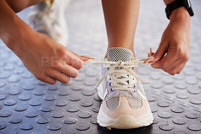 Buy stock photo Shoes, fitness and woman getting ready for training, exercise or running in sports sneakers, fashion and motivation. Feet of athlete, runner or person tying laces for cardio or workout sportswear