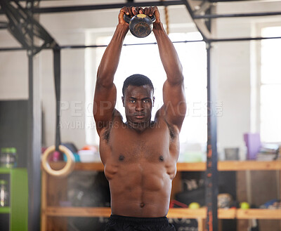 Buy stock photo Black man, bodybuilder and kettlebell for fitness in gym, arm muscle training, portrait and weightlifting exercise. Biceps, strong and bodybuilding, focus and serious with commitment to workout
