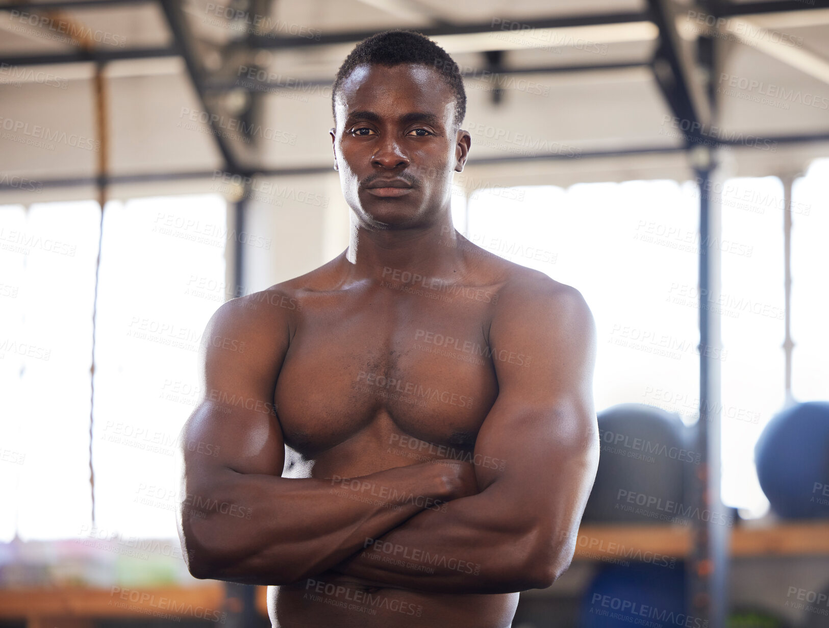 Buy stock photo Fitness, portrait and man at gym proud, training or empowered mindset on blurred background. Bodybuilder, attitude and face of black guy with motivation for body goal, exercise or workout performance